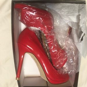 Brand new red peep toe heels